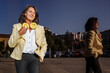 © Alberto - Modern senior latina businesswoman laughing
