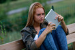 © Giulio_Fornasar - Perplexed young woman staring at a handheld tablet-pc