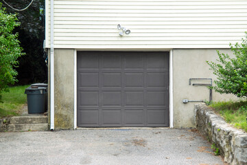 Wall Mural - one car garage door painted in black