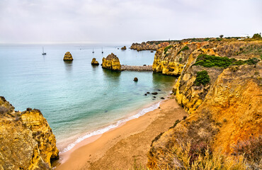 Canvas Print - Coastal cliffs at Lagos - Algarve, Portugal