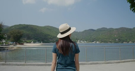 Canvas Print - Woman enjoy the landscape sea view