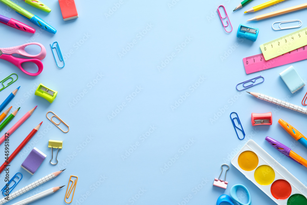 Flat lay colorful school supplies on blue background. Back to school concept. Top view, overhead. - obrazy, fototapety, plakaty 