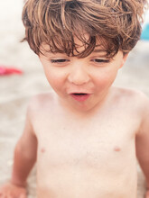 Little Boy Playing On The Beach In West Palm Beach Florida 