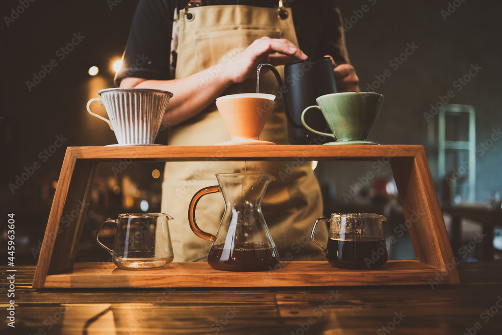 barista brewing a coffee filter drip in the morning, beverage drink with fresh black espresso aroma, hot drink in cup of cafes, brown caffeine in bar shop background - obrazy, fototapety, plakaty 