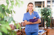 © JackF - Woman doctor wear white medical uniform and stethoscope with folder of documents in clinic