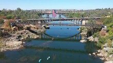 Aerial View Over Lake Natoma And Paddle Boarders And Kayakers On The River In Folsom.