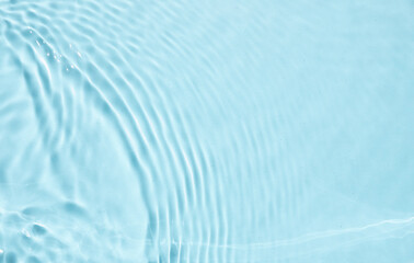 summer banner background. blue liquid colored clear water surface texture with splashes bubbles. tre