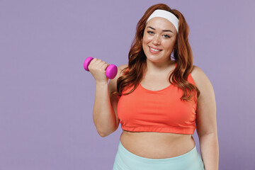 Young cheerful happy fun chubby overweight plus size big fat fit woman 20s wear red top warm up training with female dumbbells isolated on purple background home gym Workout sport motivation concept.