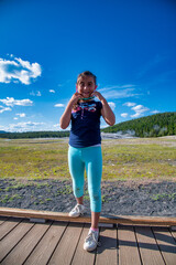 Poster - Young girl visiting Yellowstone National Park.