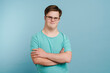 canvas print picture - Young man with down syndrome smiling and looking at camera