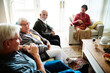 © Rawpixel.com - Senior people sitting together in a living room