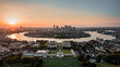 Sunset Aerial bird's eye view photo taken by drone of Greenwich park with views to Canary Wharf, Isle of Dogs, London, United Kingdom