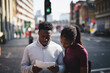 © Rawpixel.com - Couple checking a city map