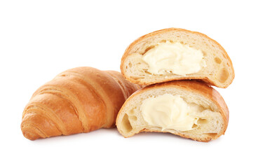 Delicious croissants with cream on white background