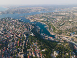 Fototapeta Miasto - Panorama of the evening city. Bird's eye view of the bay. city ​​port on the Black Sea.