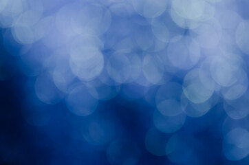 Wall Mural - abstract blue bokeh glitter sparkle background.