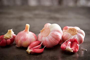 Wall Mural - Fresh whole garlic and pickled garlic