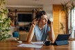 © bnenin - Adult woman, calling her boss about a problem.