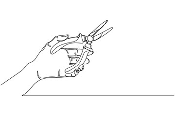 Wall Mural - Continuous one line of hand holding pliers  in silhouette on a white background. Linear stylized.Minimalist.