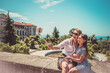© Alfira - Happy family mother and her adorable little daughter on summer vacation taking selfie with smartphone