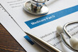 © Vitalii Vodolazskyi - Stethoscope with medicare part D drug coverage info and pen.