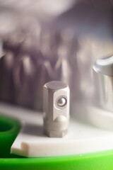 Canvas Print - Vertical closeup shot of different sizes of screwdrivers in a toolbox