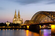 Cologne cathedral and Hohenzollern bridge at sunset 