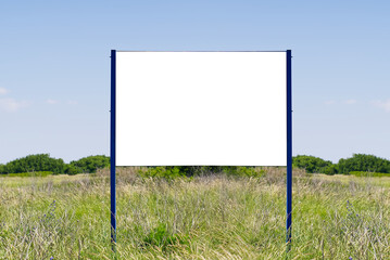 Outdoor billboard banners in fields on summer day mockup. Empty billboard blank for advertising in green field.