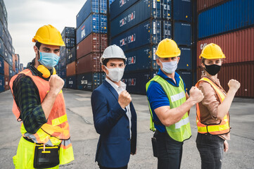 Wall Mural - Businessmen, executives and engineers wear medical face masks. While inspecting industrial plants and warehouses for international shipping businesses Concepts of import and export.