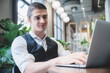 © chokniti - confident professional businessman working with laptop in modern business office workplace, executive manager man with computer technology, male businessman entrepreneur startup