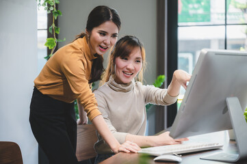 Wall Mural - business woman working successful in modern office workplace, professional young businesswoman people with laptop computer technology are work in communication corporate partner team