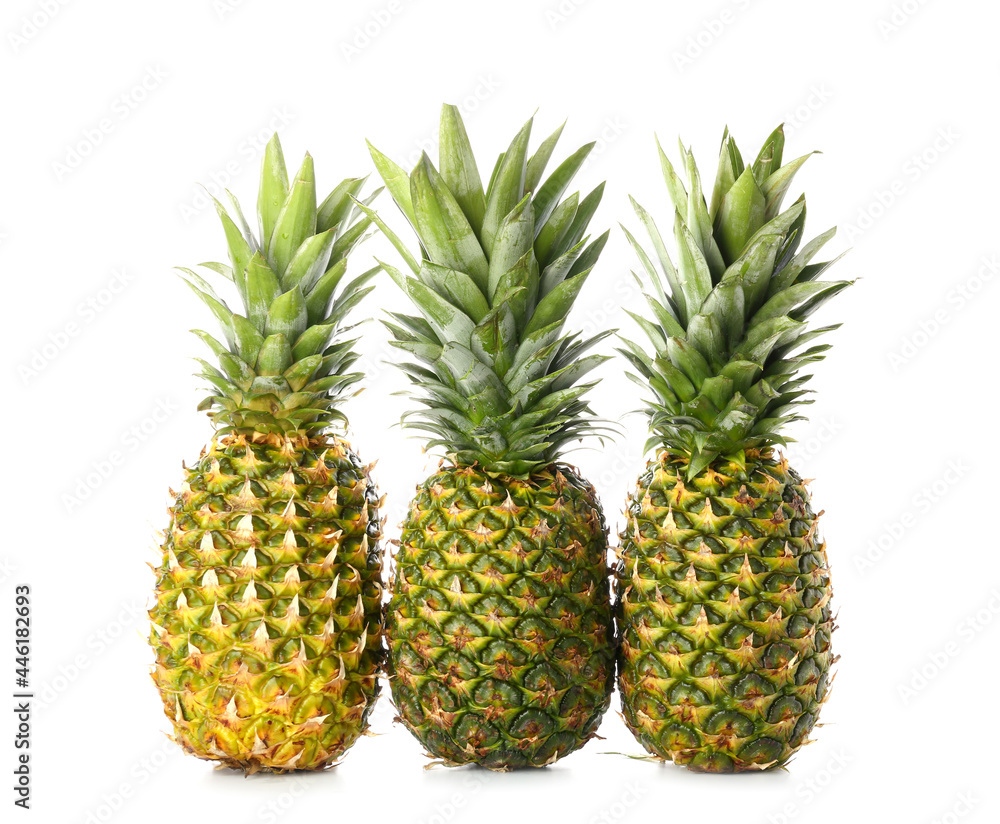 Fresh pineapples on white background