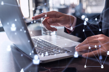 Wall Mural - hands of hr specialist is typing the keyboard in the internet to find the best candidates to create 