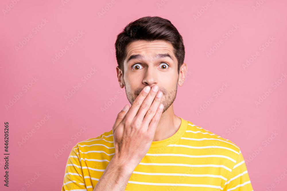 Photo of sad brunet millennial man close mouth wear yellow t-shirt isolated on pink color background - obrazy, fototapety, plakaty 