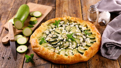 Wall Mural - zucchini quiche with feta cheese and mint