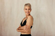 © Jacob Lund - Carefree mature woman embracing her aging body
