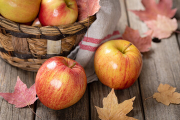 Wall Mural - Fresh Red Apples on a Wooden Table