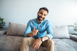 © Stock 4 You - Portrait of successful handsome indian man talking to camera sharing experience