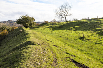 Wall Mural - Some of the Iron Age ramparts of Uley Bury a large multivallate hillfort on a spur of the Cotswold escarpment at Uley, Gloucestershire UK