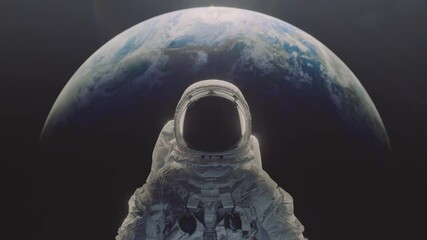 dolly in shot of an astronaut with planet earth n the background.
