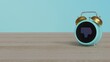 © Destrosvet - 3d rendering of color alarm clock with symbol of social dislike on display on table