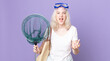 © kues1 - young pretty albino woman looking angry, annoyed and frustrated with goggles and a fishing net