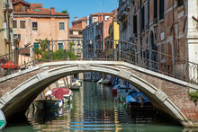 Canal View With Bridge San Stin In The Old Quarter San Polo In Venice, Italy