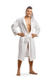 © Ljupco Smokovski - Full length portrait of a young fit man wearing a white bathrobe