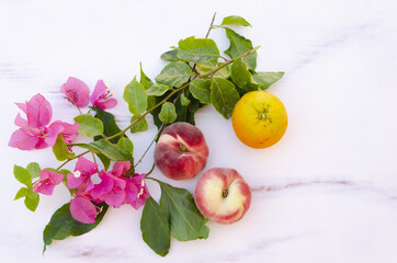 Sticker - Top view of pink bougainvillea flower, fig peaches and lemon isolated on a white background