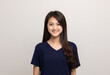 © Chanakon - Beautiful young asian woman standing on isolated white background. Thai Teenage girl around 20 looking at camera.
