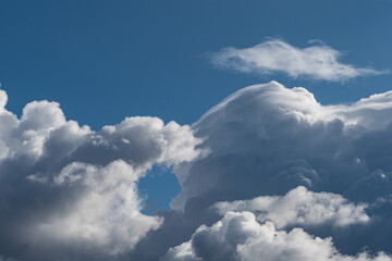 Wall Mural - beautiful thick cloud under the blue sky on a sunny day