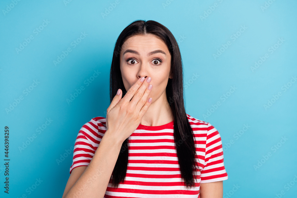 Photo of shocked amazed surprised woman cover close mouth with hand feel guilty isolated on blue color background - obrazy, fototapety, plakaty 