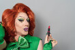 Happy drag queen portrait doing makeup