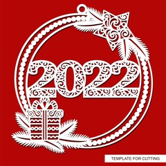 Christmas ball with numbers 2022. Round hanging decoration for the New Year holidays. Frame with a star, a gift, spruce branches.  Vector template for plotter laser cutting of paper, wood carving.